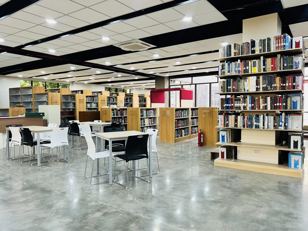 Silliman University learning commons, wide reading area with study tables