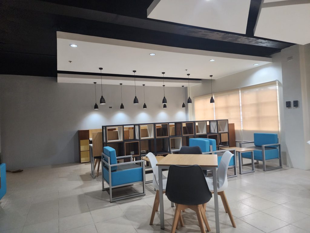 Study room with blue booths and shared tables