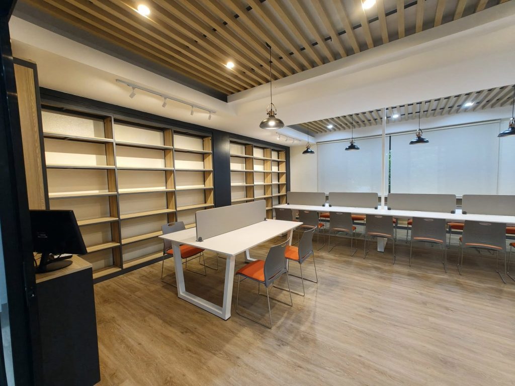 Bright reading room with new shelving and study tables