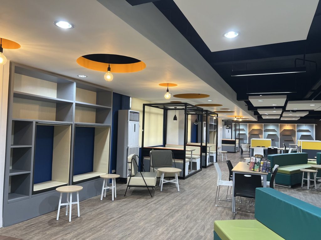 Colorful open study floor with varied seating